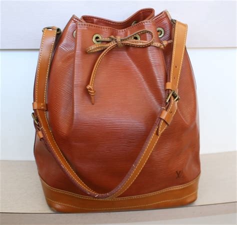 louis vuitton noe epi brown petit|Louis Vuitton noe bb handbag.